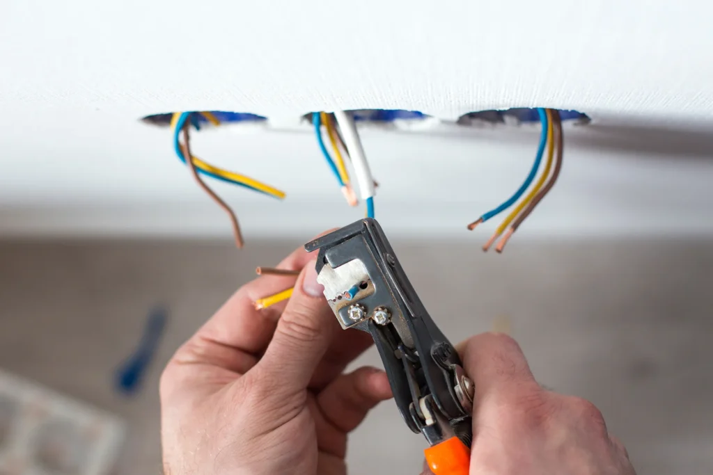 Electrician Stripping Electrical Wires